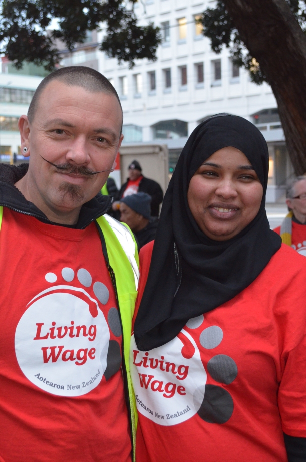 Kieran Monaghan (left) and fellow Living Wage activist Naima Abdi at the “Mop March” for Wellington City Council contract cleaners